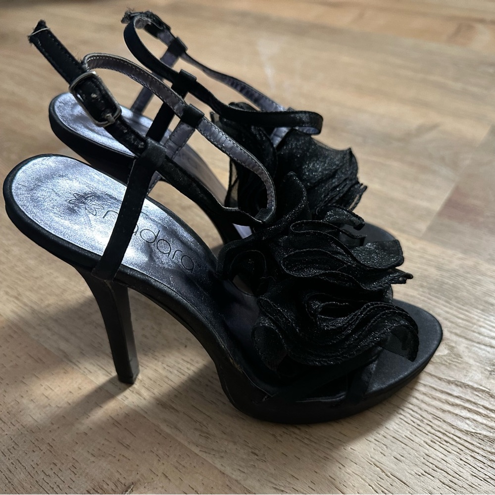 Black Nadara heels with black flower, gently used. As is.